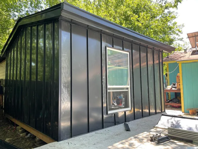 Black standing seam metal wall panels for Metal Roof Installation in Barnhart