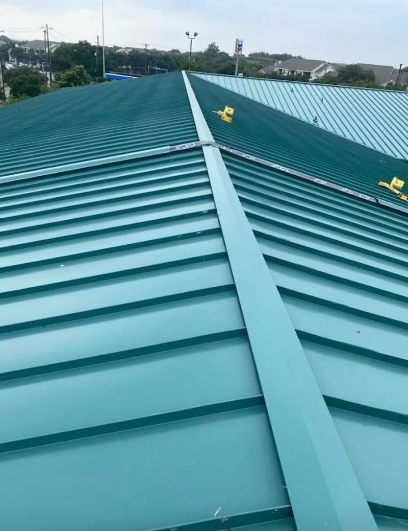 Green commercial metal roof ridge and valley for Metal Roof Repair in Barnhart